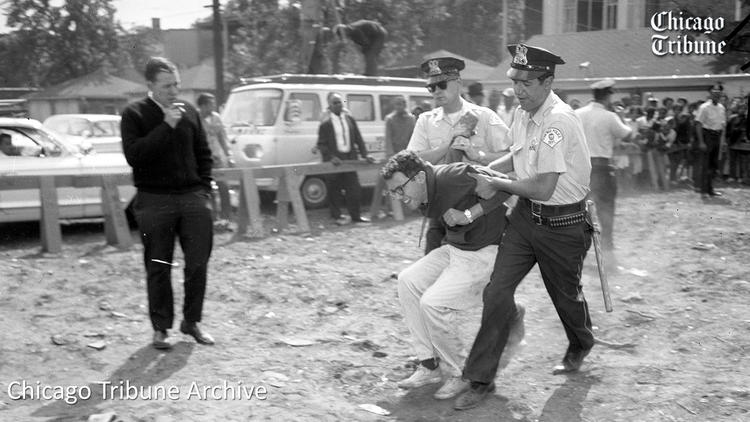 A 21-year-old Bernie Sanders being arrested by the Chicago PD at a civil rights protest in 1963.